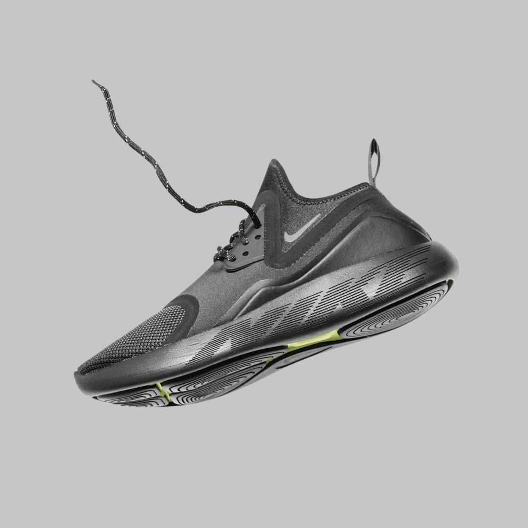 A Nike product photo on a gray background, created with the Background Changer.