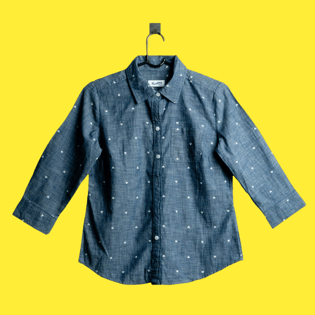 A shirt product photo on a yellow background, created with the Background Changer.